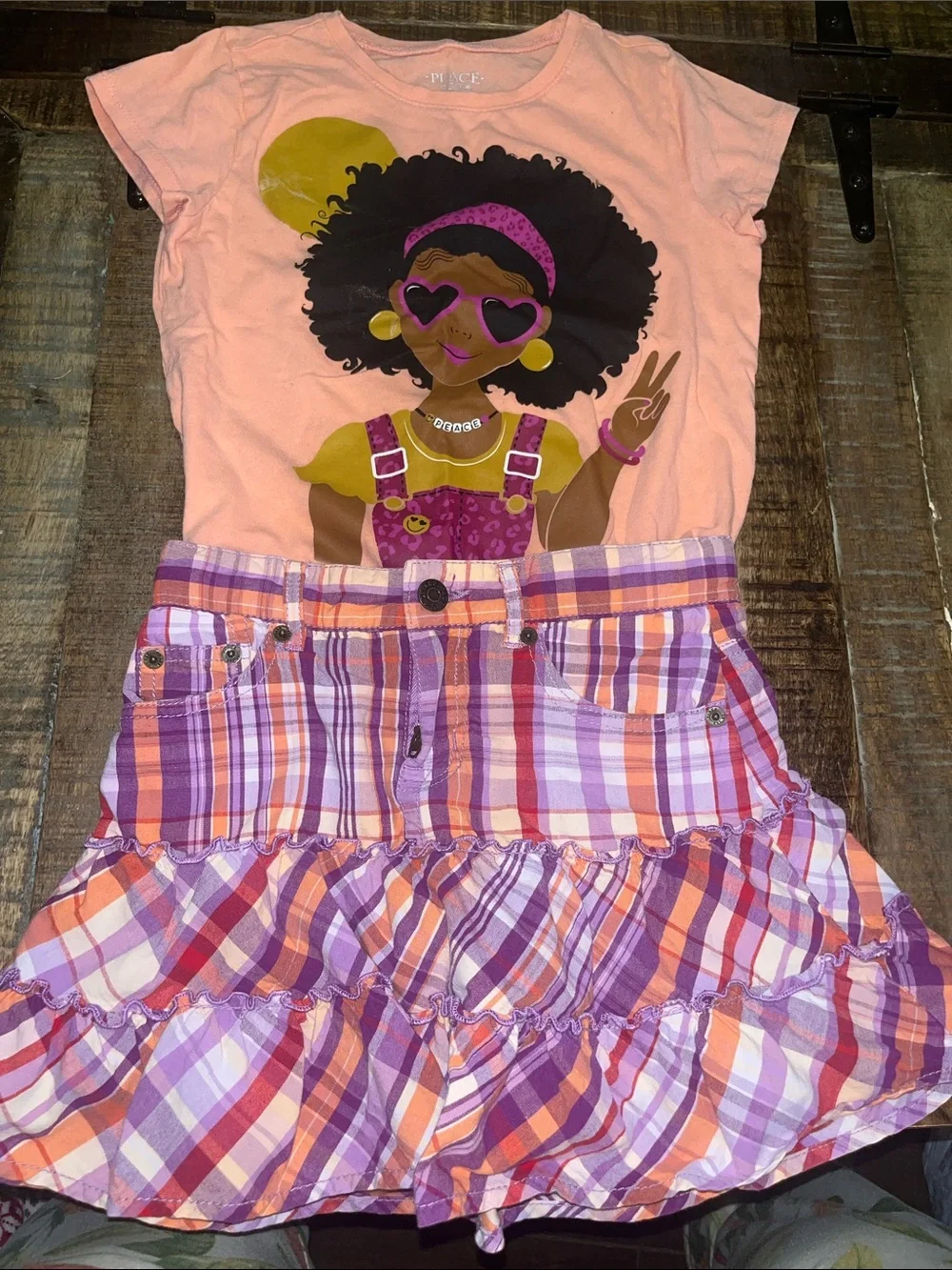 Place Peach Graphic Tee with Purple & Orange Plaid Ruffle Skirt